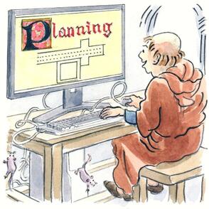 Picture of a monk at a computer.